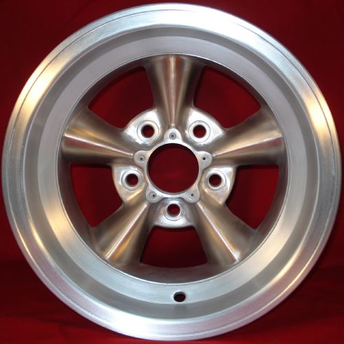 Strombecker #8314 chrome mag spoke wheels and #8442 Cheater Slick tires 1 pair. 