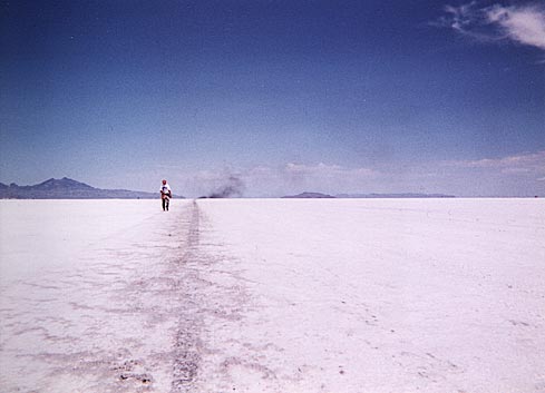 Don examining the course surface